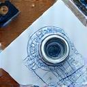 A coffee designer sketching new brew methods