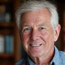 Portrait of David Wallace, a man in his 50s with a thoughtful expression.
